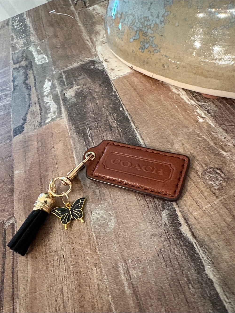 coach bag tag